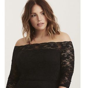Floor length black lace dress from Torrid